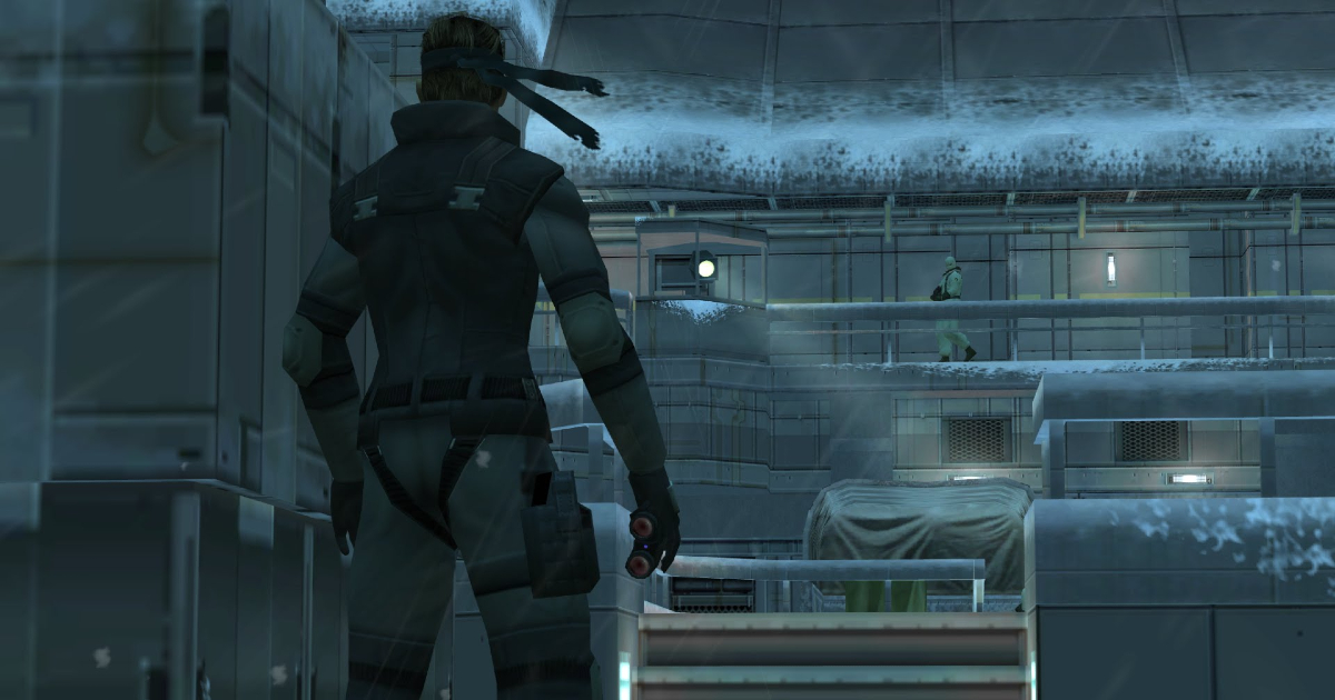 snake è di spalle di fronte all'ingresso della base di shadow moses all'inizio di metal gear solid - nerdface