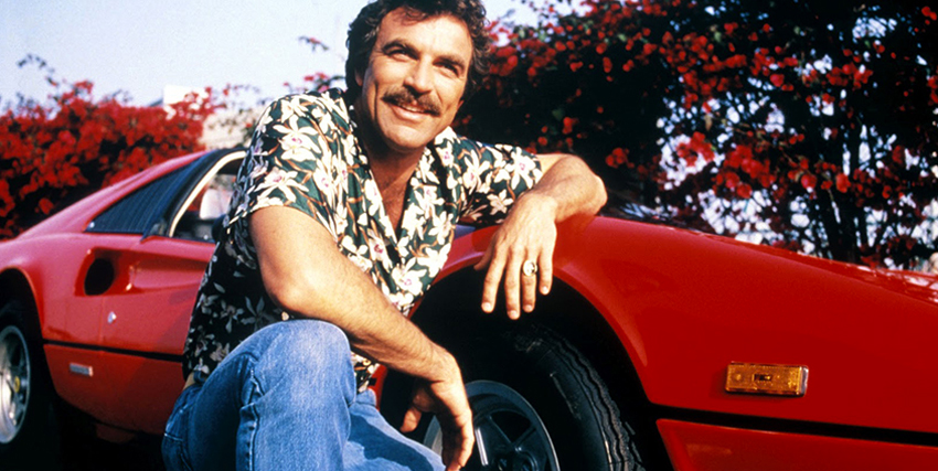 magnum pi è seduto accanto alla ferrari - nerdface