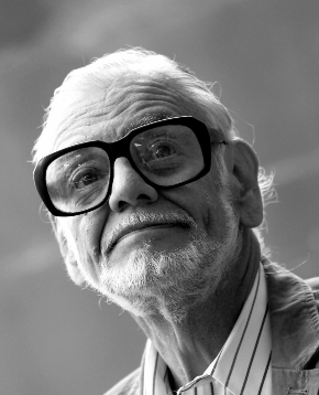 george a. romero guarda incuriosito in una direzione - nerdface