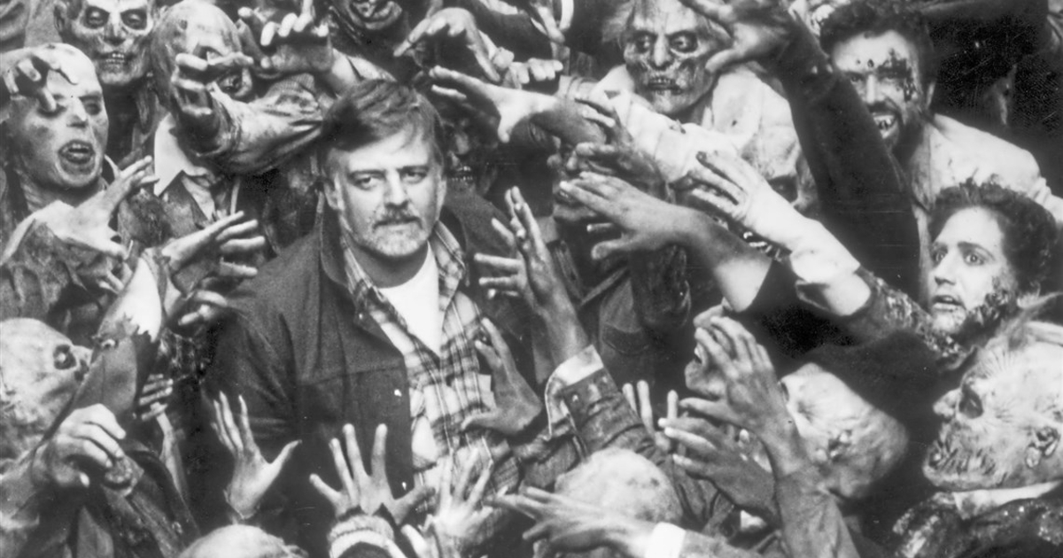 una celebre immagine in cui george a. romero è circondato dai suoi zombie - nerdface