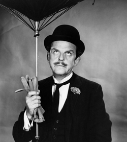 david tomlinson si ripara sotto un ombrello rotto - nerdface