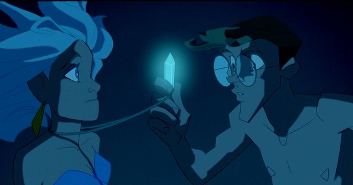in atlantis l'impero perduto il protagonista osserva un cristallo luminoso - nerdface
