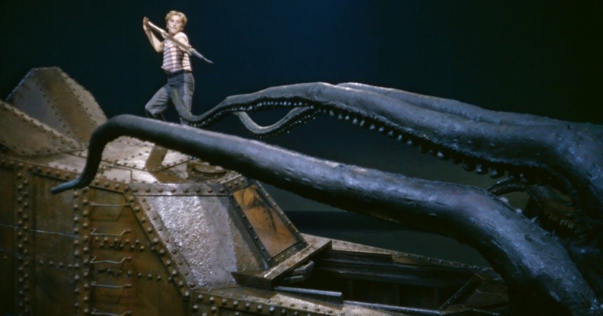 nem cerca di arpionare un enorme piovra mentre è sopra il nautilus, nel film 20.000 leghe sotto i mari del 1954 - nerdface