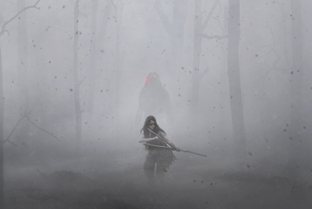 un predatore nella nebbia segue in silenzio una cacciatrice primitiva - nerdface