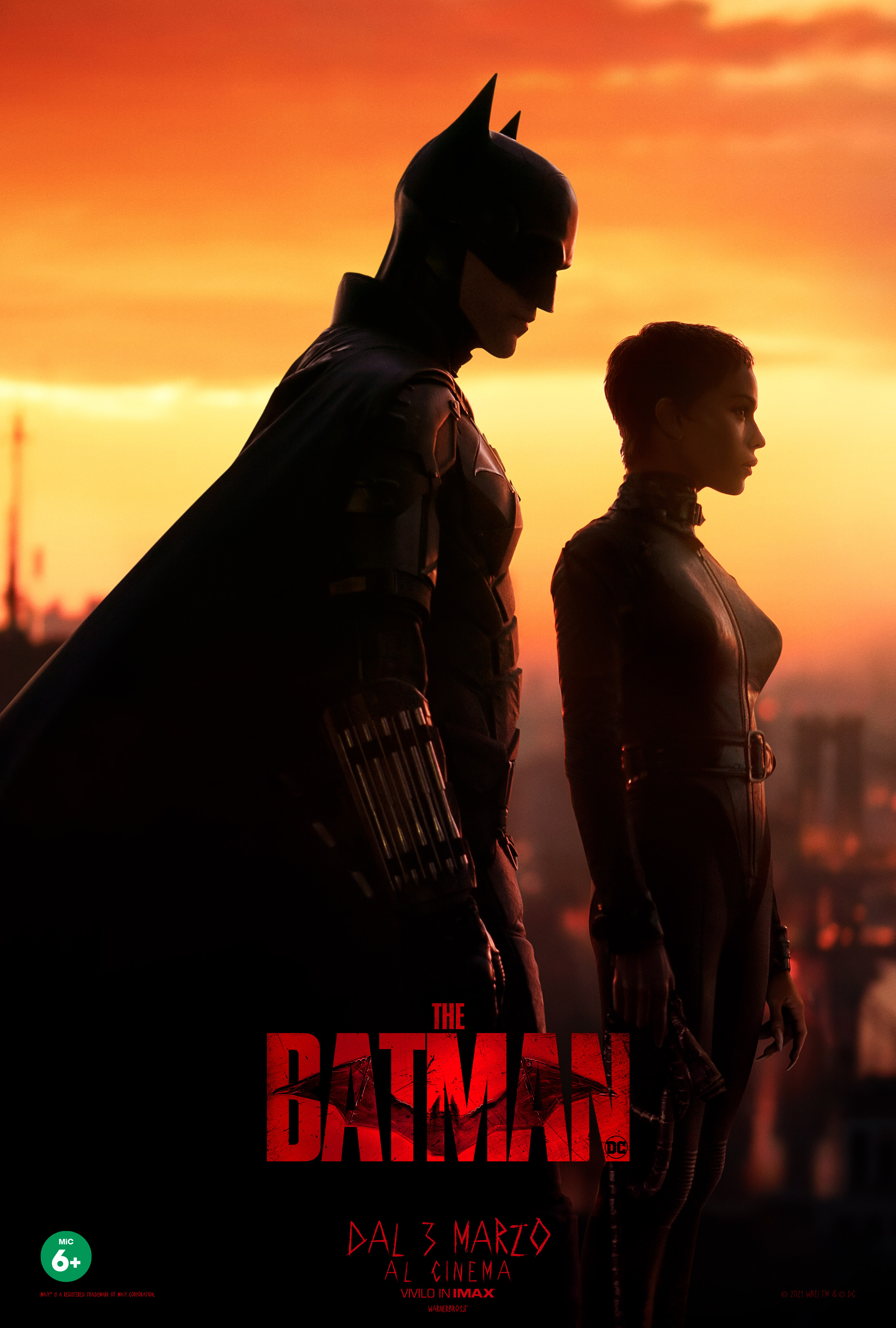 batman e catwoman guardano il tramonto da un tetto - nerdface