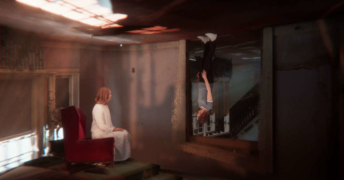 una donna seduta in una stanza accoglie una ragazza che cammina sul soffitto - nerdface