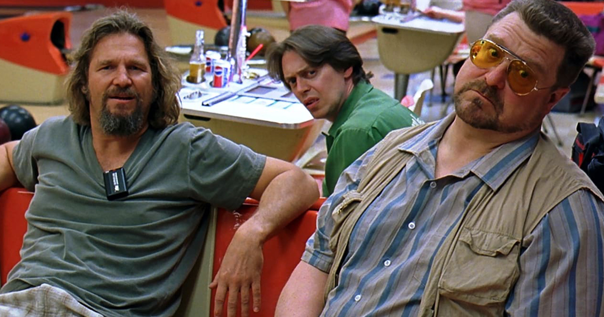 i tre amici sono seduti alla pista da bowling - nerdface