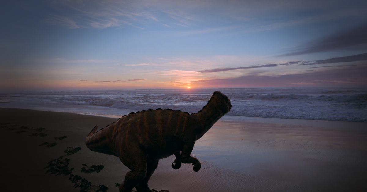 un dinosauro cammina sul bagnasciuga e guartda il sole al tramonto - nerdface