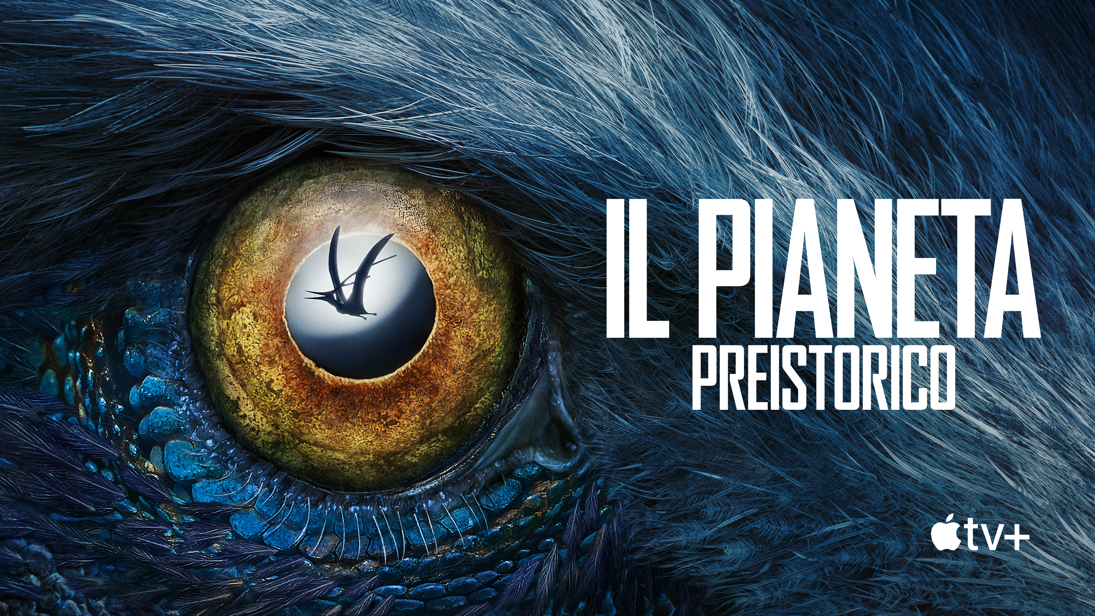 lo sguardo di un animale presitorico è al centro del poster de il pianeta preistorico - nerdface