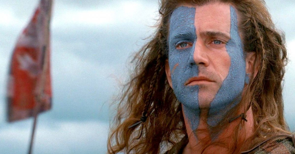 la celebre foto di mel gibson col volto pitturato dalla bandiera scozzese in braveheart - nerdface