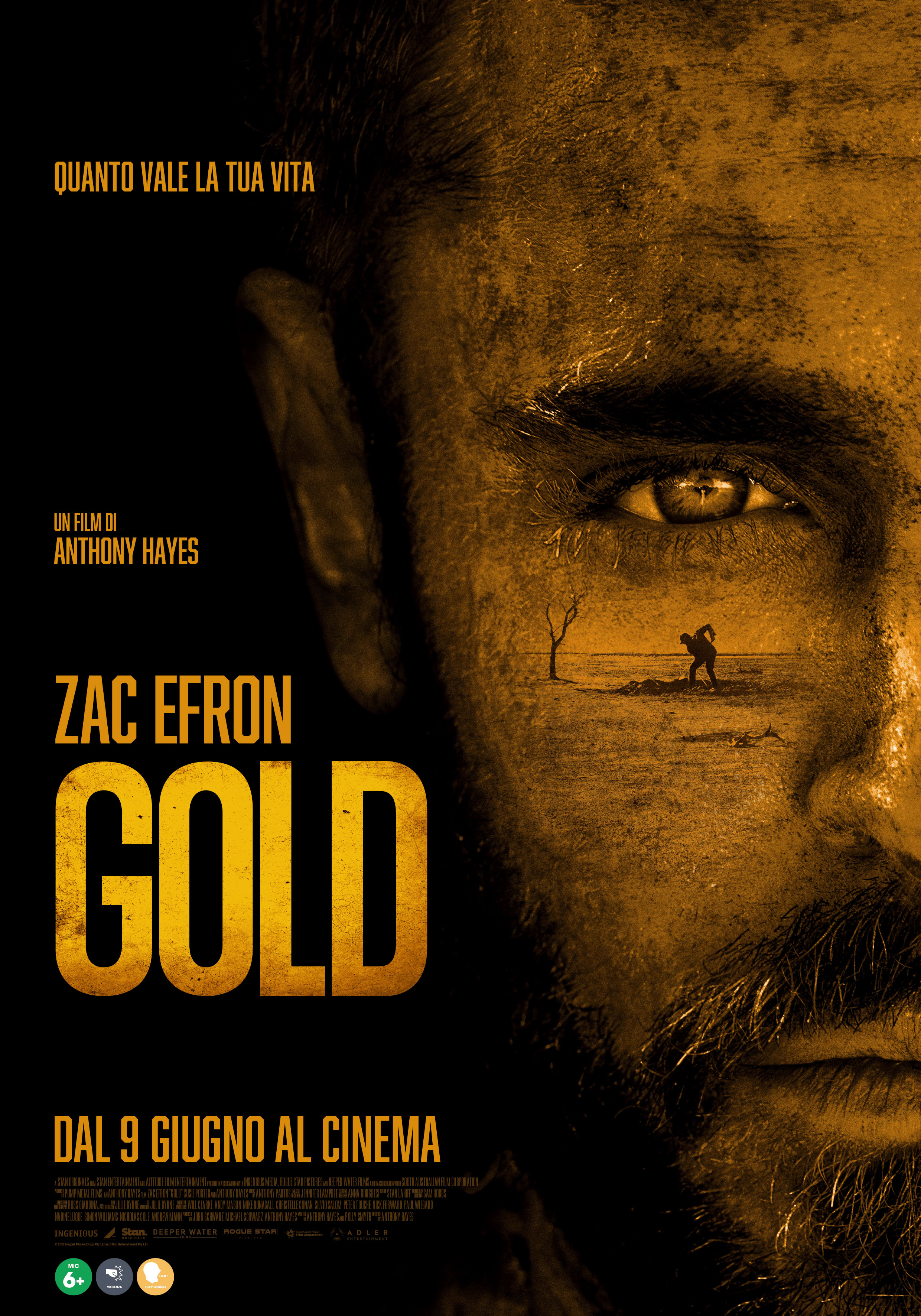 parte del viso di zac efron è al centro del poster di gold - nerdface