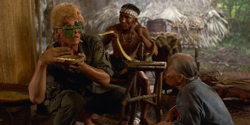 rutger hauer con le foglie sugli occhi è nutrito da alcuni vietnamiti in furia cieca - nerdface