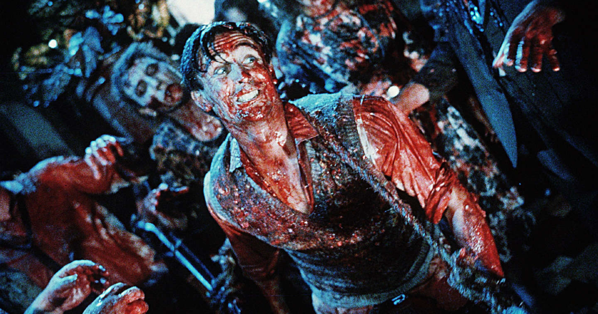 un uomo ricoperto di sangue è circondato da zombie in splatters gli schizzacervelli - nerdface