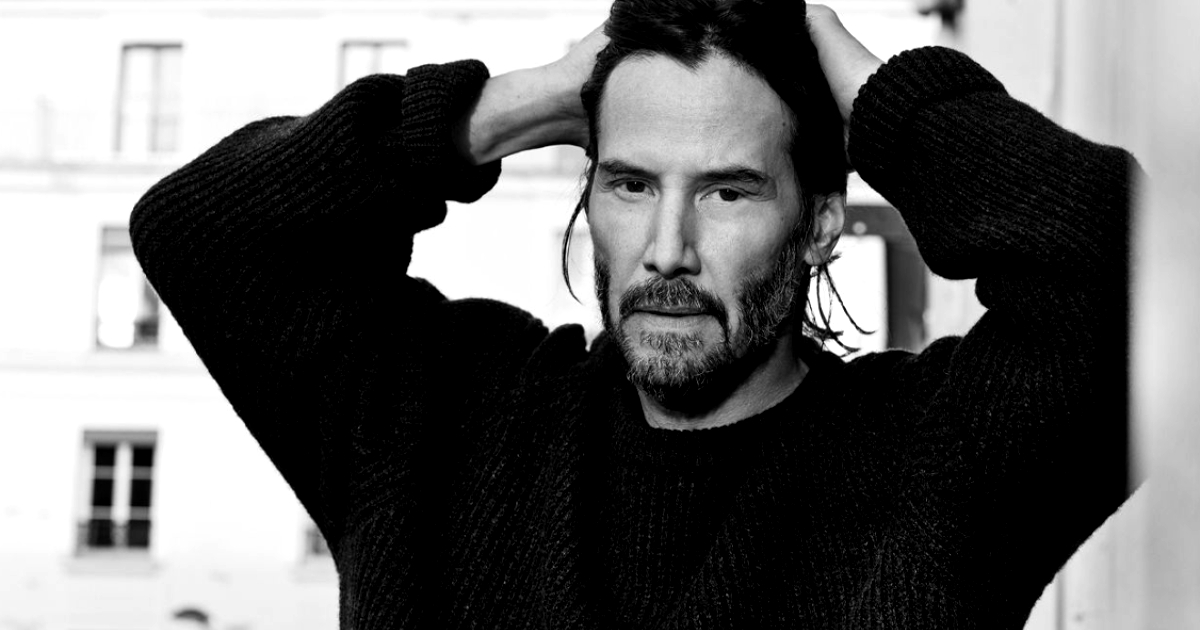 keanu reeves si tiene in capelli in un ritratto in bianco e nero - nerdface