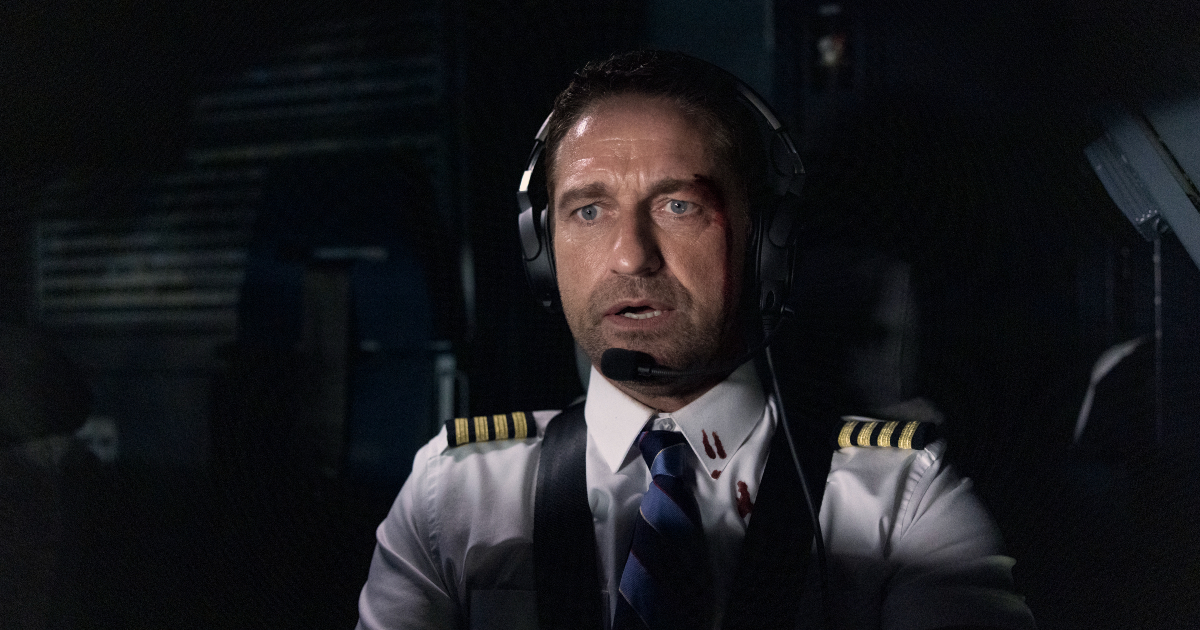 gerard butler sembra preoccupato mentre pilota l'aereo in the plane - nerdface