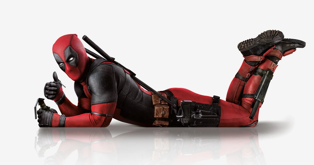 deadpool è steso e fa l'ok con una bomba in mano: uno strano messia - nerdface