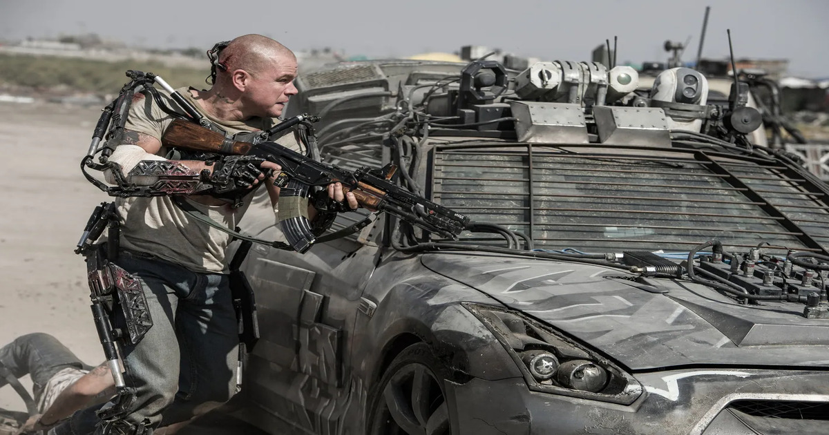 Matt Damon completamente armato si rifugia dietro una macchina - nerdface