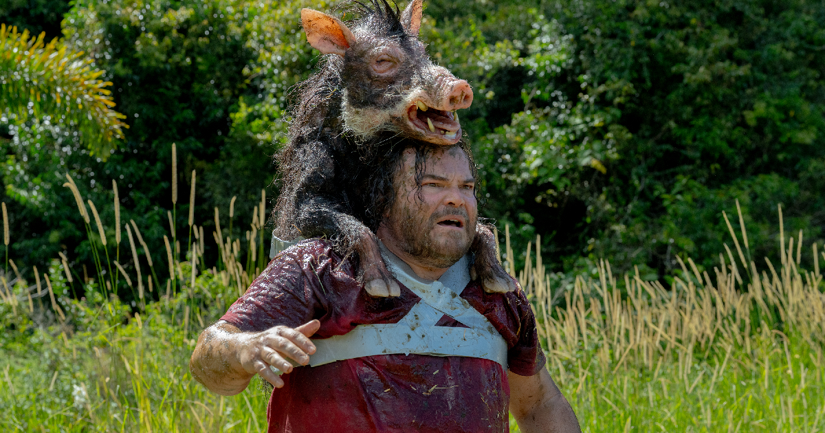jack black corre con un suino incollato sulle spalle in anaconda - nerdface