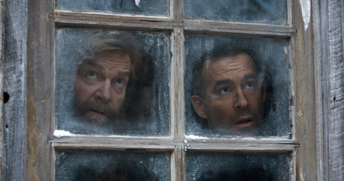 kenneth branagh e ryan reynolds guardano fuori da una finestra nel trailer di mayday - nerdface