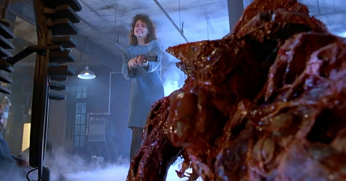 geena davis imbraccia un fucile ne la mosca per sparare allo scienziato - nerdface